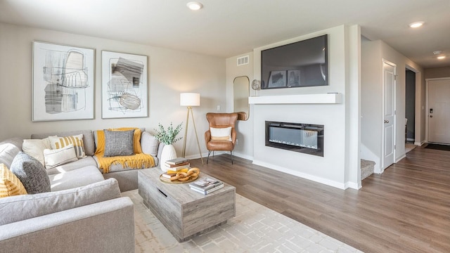 living room featuring hardwood / wood-style floors