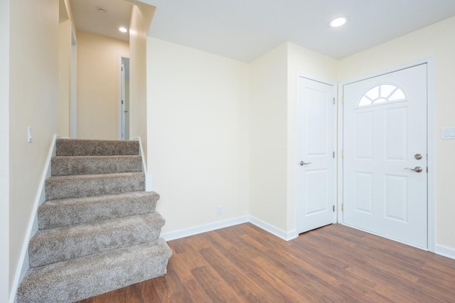 foyer with dark hardwood / wood-style flooring