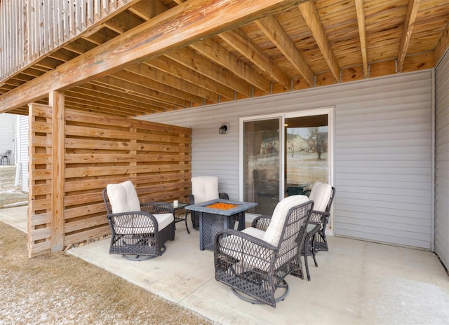 view of patio / terrace with a fire pit