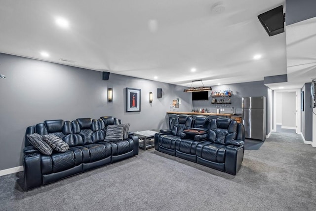 living room with carpet flooring and bar