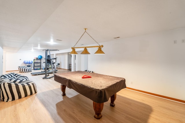 game room featuring billiards, baseboards, and wood finished floors