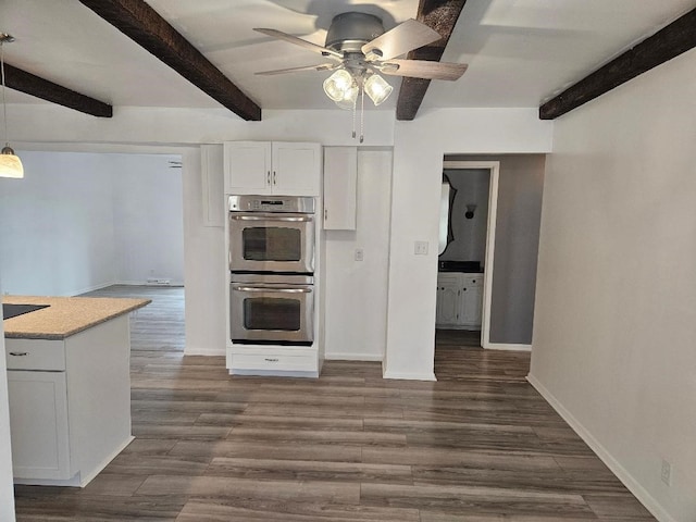 kitchen with white cabinetry, dark wood-type flooring, double oven, and decorative light fixtures