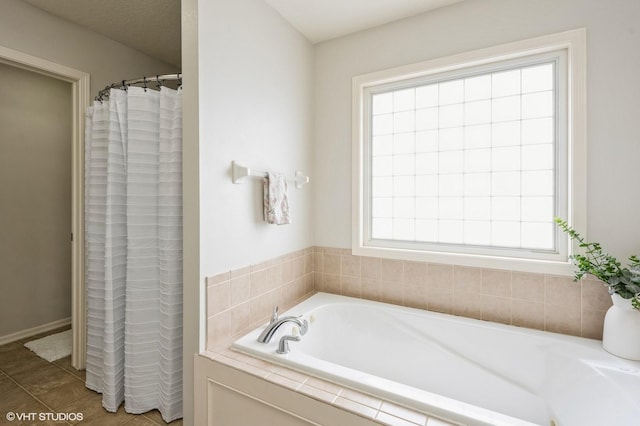 bathroom with a garden tub