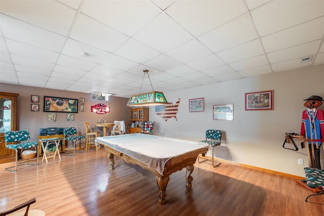 playroom featuring hardwood / wood-style flooring, indoor bar, a paneled ceiling, and billiards