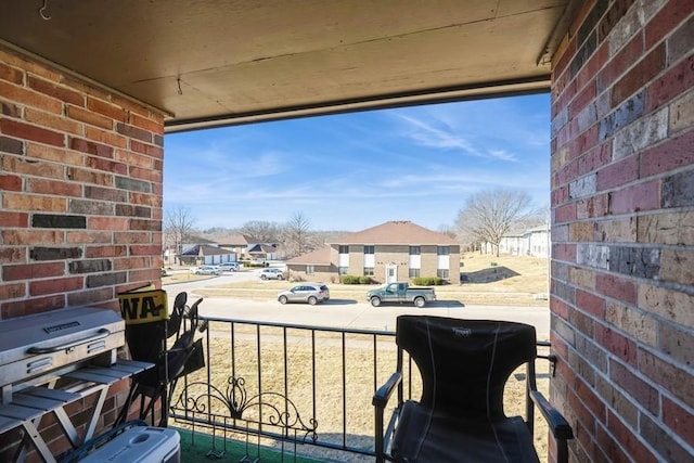 balcony featuring a residential view