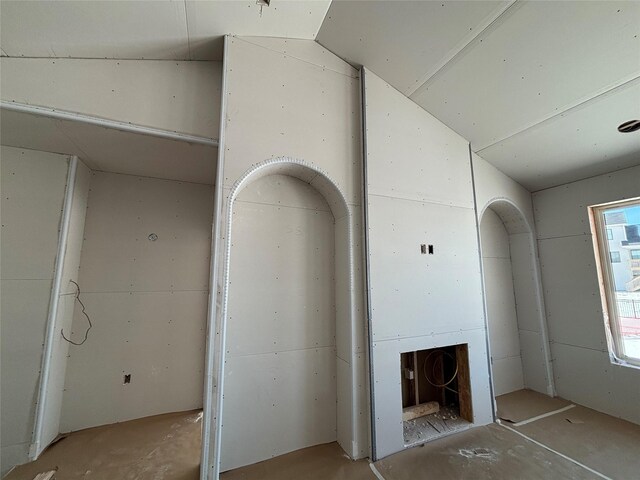 interior space featuring vaulted ceiling