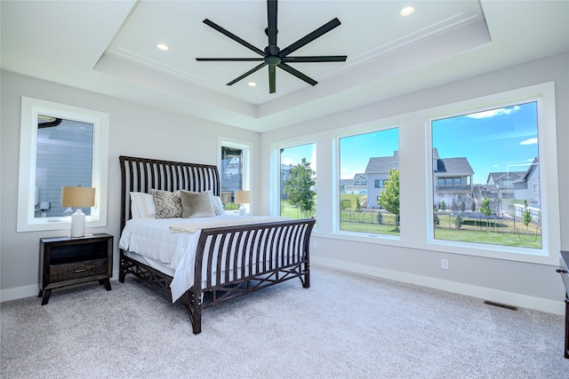 16217 Walnut Meadows Ct, Urbandale, IA 50323 - carpeted bedroom with a raised ceiling, baseboards, recessed lighting, and ceiling fan