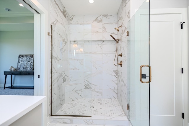 16217 Walnut Meadows Ct, Urbandale, IA 50323 - bathroom featuring a marble finish shower, recessed lighting, and marble look tile flooring