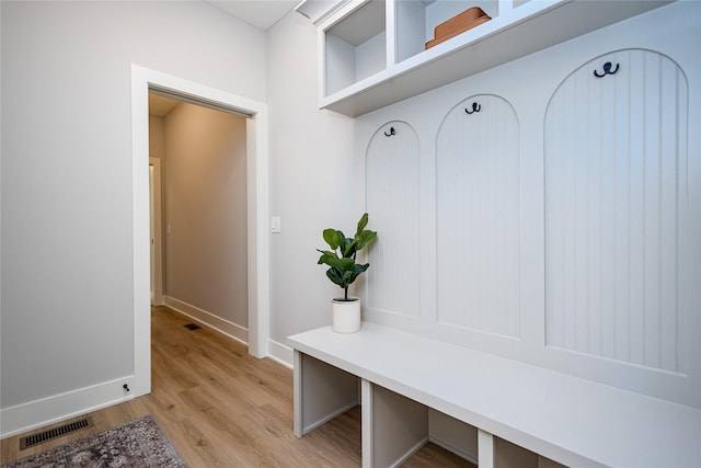 16217 Walnut Meadows Ct, Urbandale, IA 50323 - mudroom with light wood-style flooring and baseboards