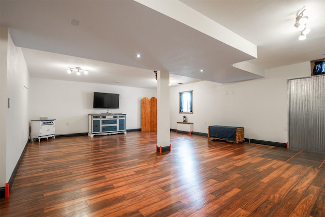 basement featuring dark wood-type flooring