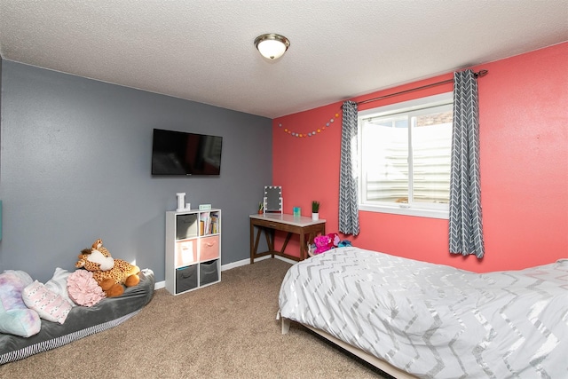 carpeted bedroom featuring a textured ceiling