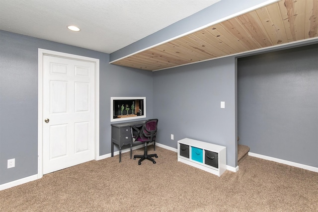 home office featuring wood ceiling and carpet flooring