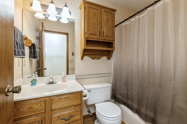 bathroom with vanity, a shower with shower curtain, and toilet