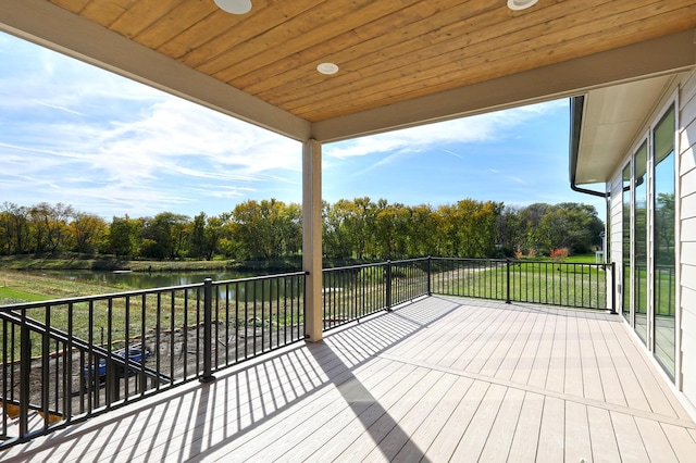 deck featuring a water view