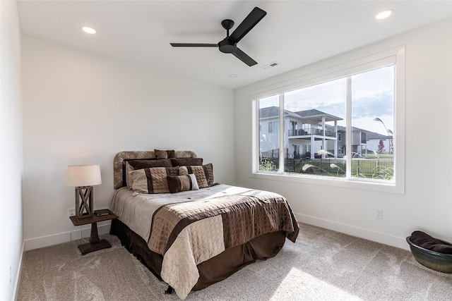 bedroom featuring carpet, visible vents, baseboards, and recessed lighting