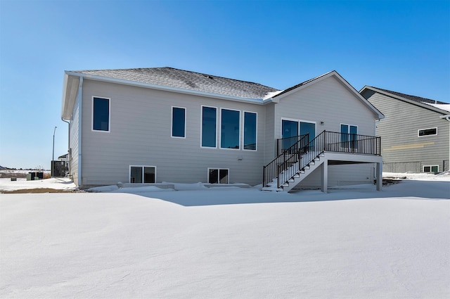 view of snow covered house