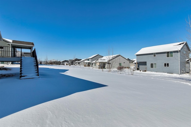 view of yard covered in snow