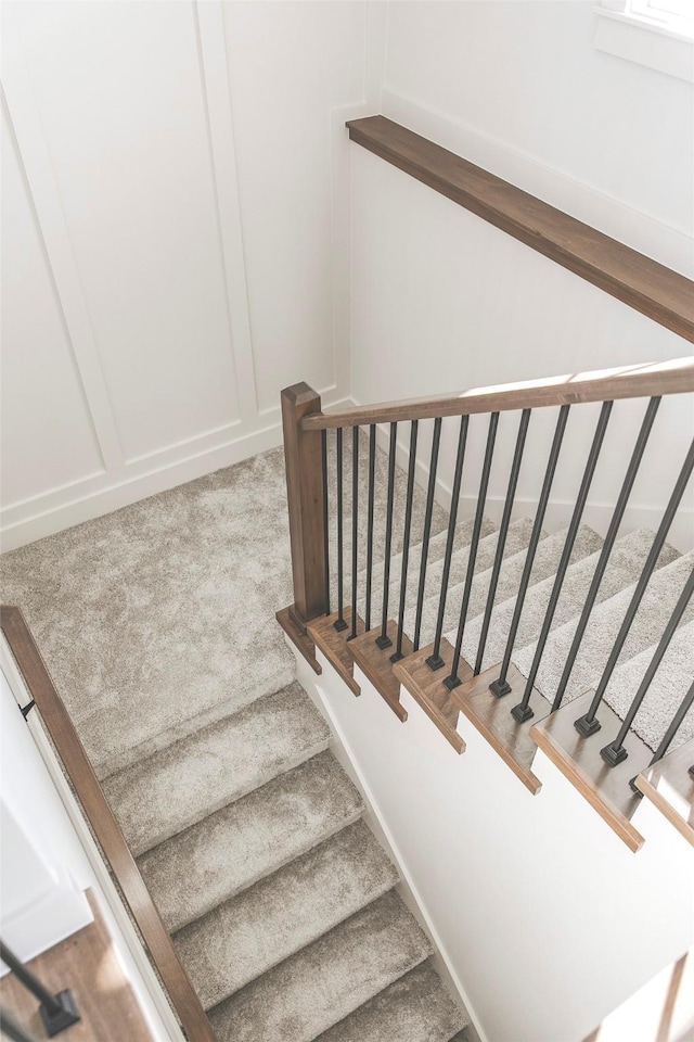 stairway with carpet flooring