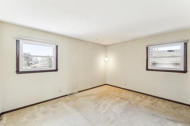 view of carpeted spare room