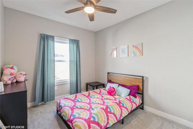 1210 NW Pine Bluff Cir, Waukee, IA 50263 - carpeted bedroom featuring baseboards and a ceiling fan