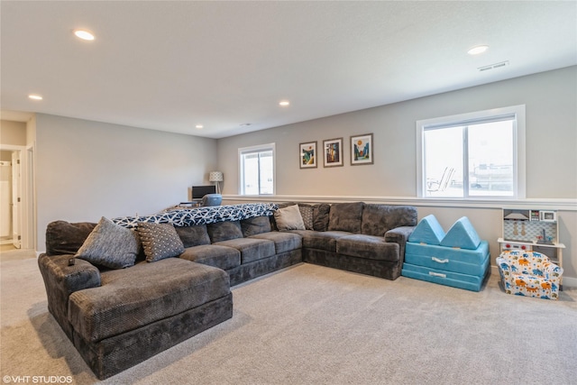 1210 NW Pine Bluff Cir, Waukee, IA 50263 - carpeted living area featuring recessed lighting