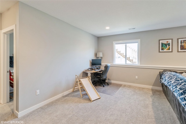 bedroom with light carpet