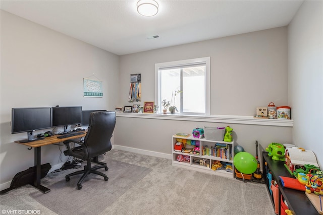 home office featuring light colored carpet