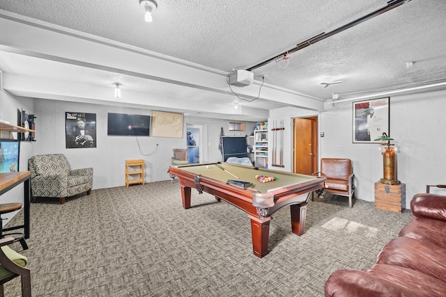 game room featuring pool table, carpet flooring, and a textured ceiling