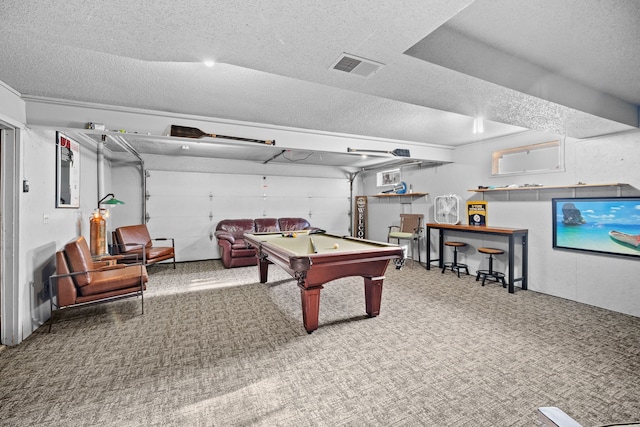 playroom featuring billiards, a textured ceiling, and carpet flooring