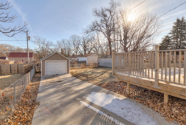 exterior space with an outbuilding and a garage