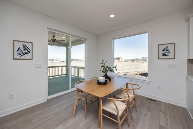 dining room featuring hardwood / wood-style flooring