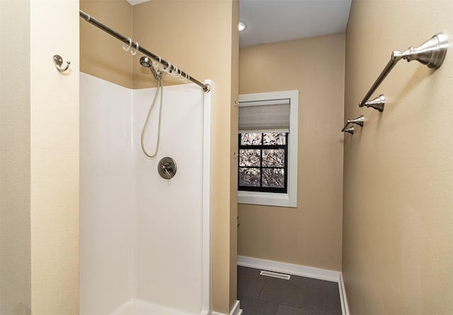 bathroom featuring a shower