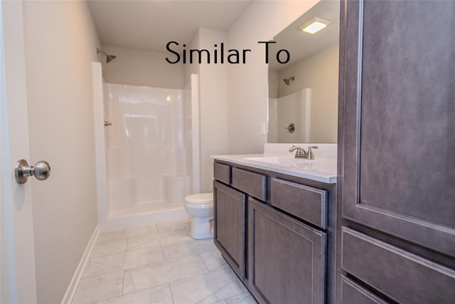 bathroom featuring walk in shower, vanity, and toilet