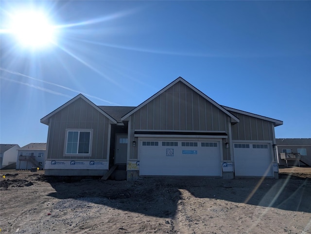 view of front of property featuring a garage