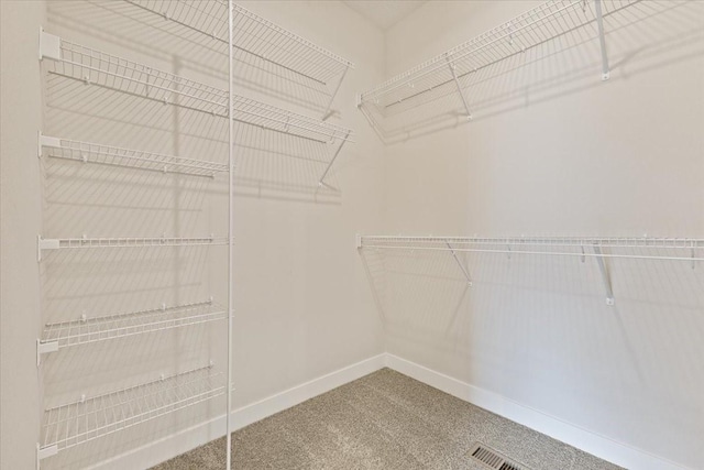 1902 16th Cir SE, Altoona, IA 50009 - walk in closet featuring carpet
