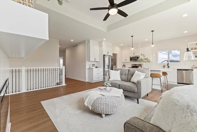 1902 16th Cir SE, Altoona, IA 50009 - living area with ceiling fan, light wood-type flooring, and recessed lighting
