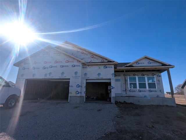 property under construction featuring a garage