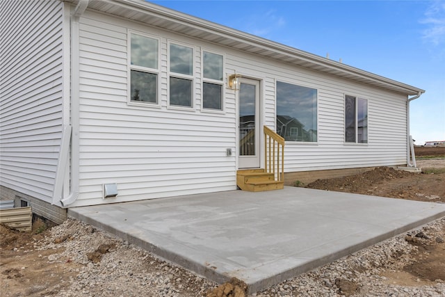 1632 20th Ave SE, Altoona, IA 50009 - rear view of property featuring entry steps and a patio area