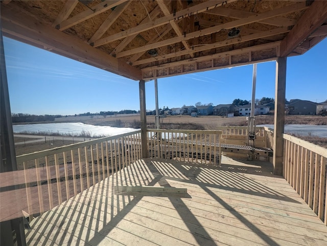 wooden terrace with a water view