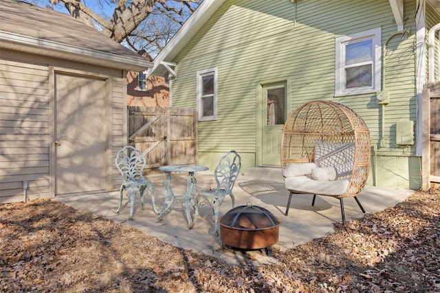 view of patio / terrace with an outdoor fire pit