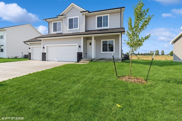319 41st St SW, Altoona, IA 50009 - view of front of house featuring concrete driveway, a front lawn, a garage, and roof with shingles