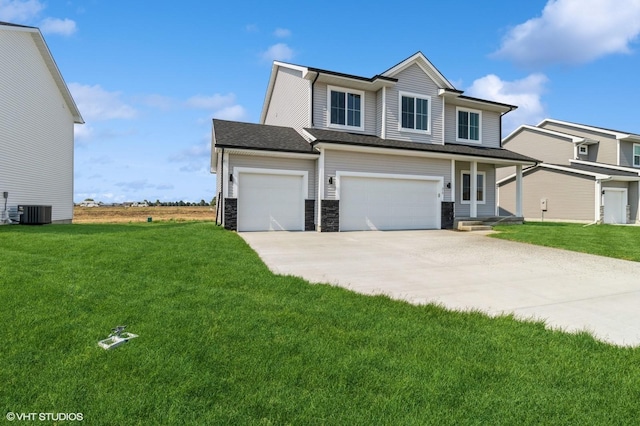 319 41st St SW, Altoona, IA 50009 - view of front of home featuring concrete driveway, a front yard, an attached garage, and stone siding