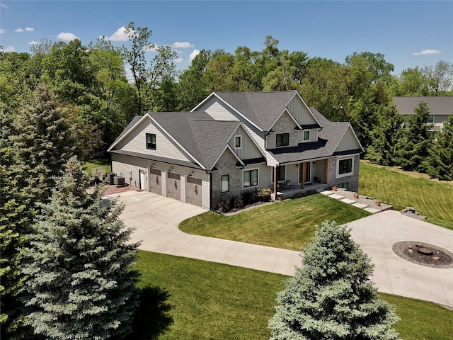114 Tradition Dr, Polk City, IA 50226 - craftsman-style home featuring driveway, a porch, a front yard, board and batten siding, and roof with shingles