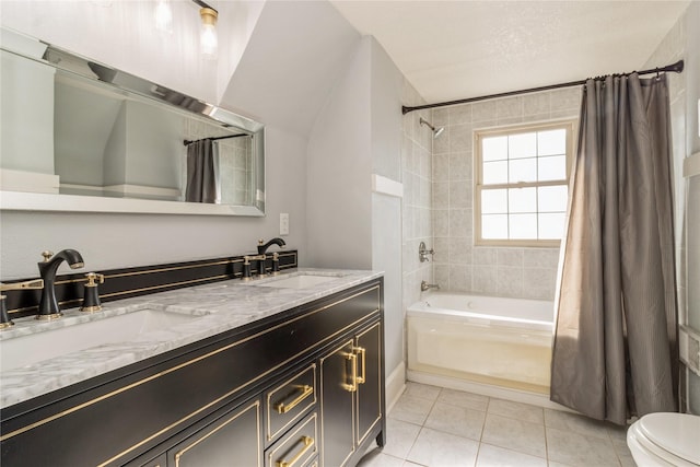 full bathroom featuring shower / tub combo with curtain, vanity, tile patterned flooring, and toilet