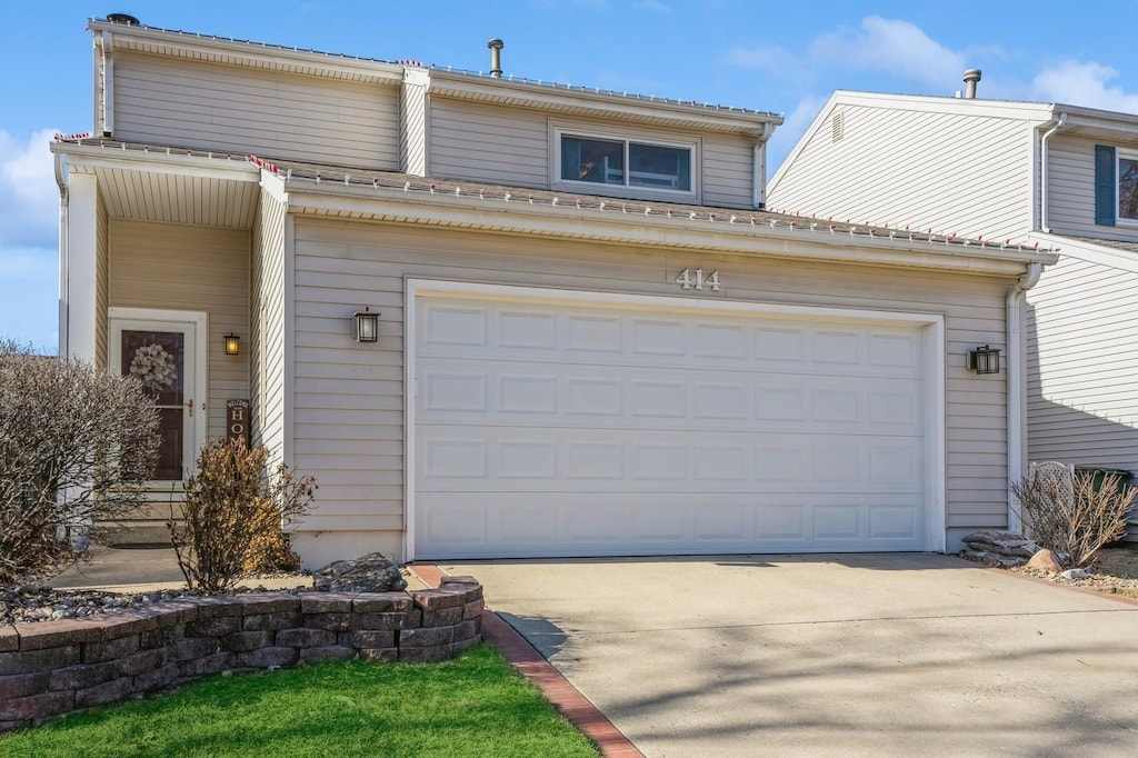 view of property featuring a garage