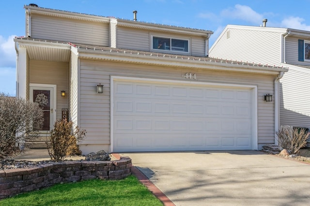 view of property featuring a garage