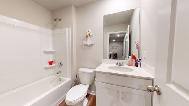 full bathroom featuring shower / bathing tub combination, vanity, and toilet