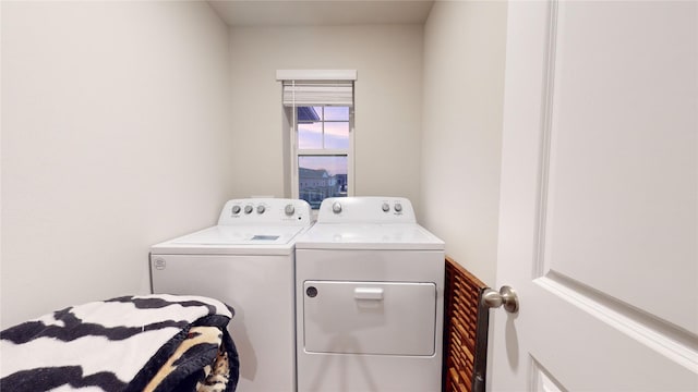 laundry area featuring independent washer and dryer