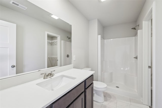 full bath with toilet, visible vents, marble finish floor, a shower, and vanity