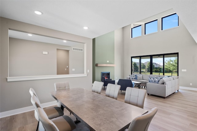 dining area with a healthy amount of sunlight and light wood-type flooring